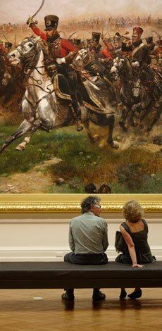 Visitors looking at Rorke's Drift in the Art Gallery of NSW